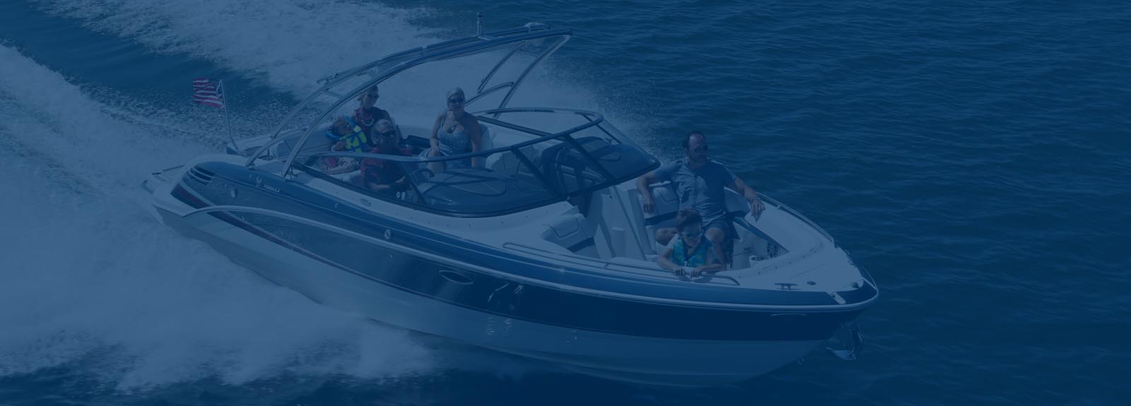 a group of people are on a boat that says ' cruiser ' on the side